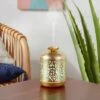200ml Metal Flower Cutout Color-Changing Oil Diffuser Gold - Opalhouse™ -Opalhouse Homeware GUEST 77fb4650 e09a 4eb2 8600 a15c6ef93d2c